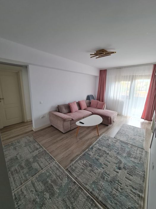 Vand apartament cu 2 camere situat pe Soseaua Iasi-Voinesti, loc de parcare inclus .