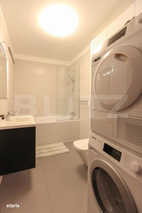 Apartament modern cu 2 camere, incalzire in pardoseala, parcare, zona