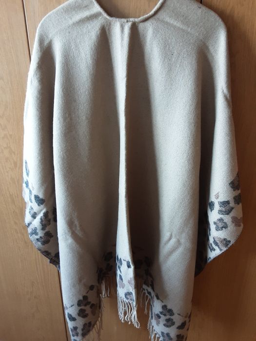 Жилетки, сако и пончо