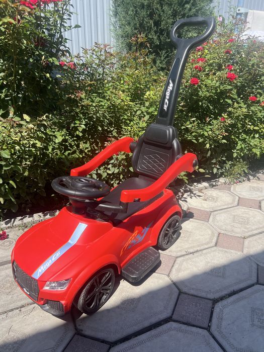 Детская машинка толкунок