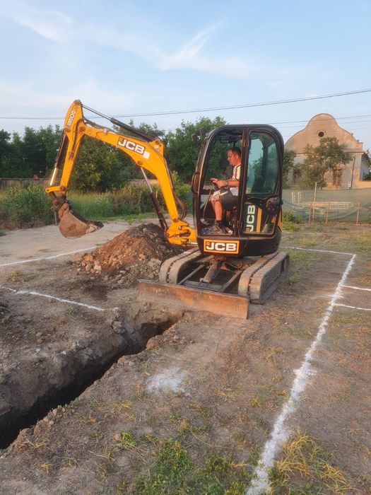 Miniexcavator 2.7+platforma Arad-150lei /ora.intru pe poartă 2m