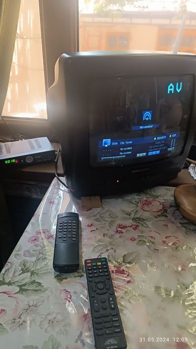 Телевизор "Crundig"с тюнером б/у .