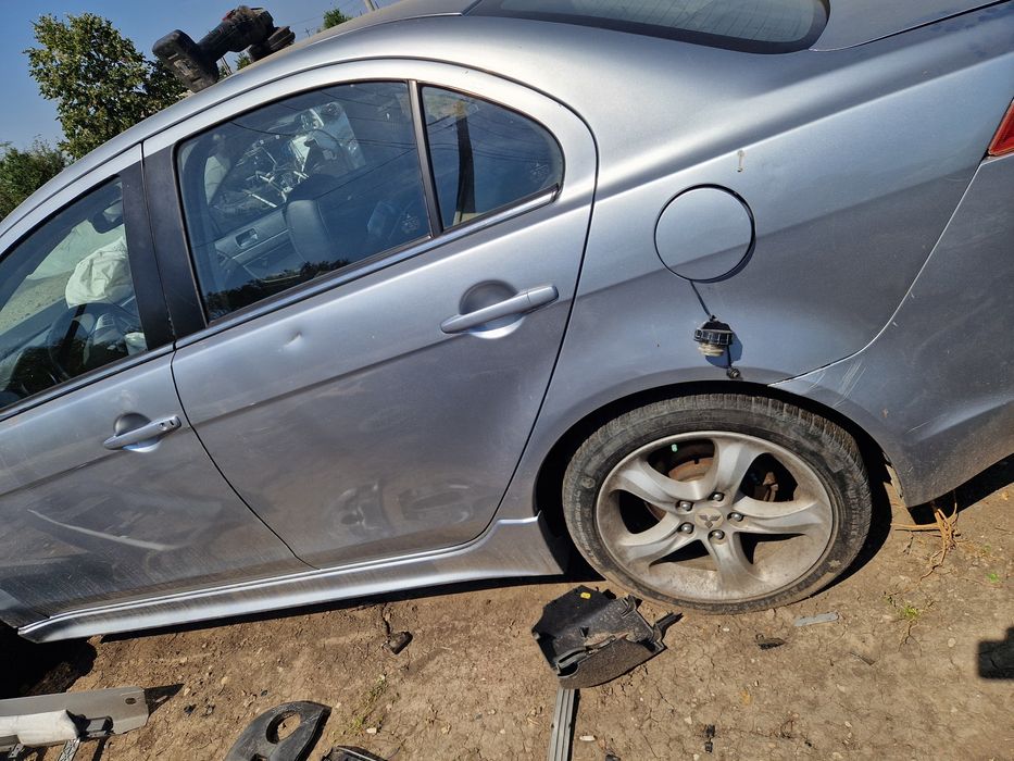Dezmembrez mitsubishi lancer