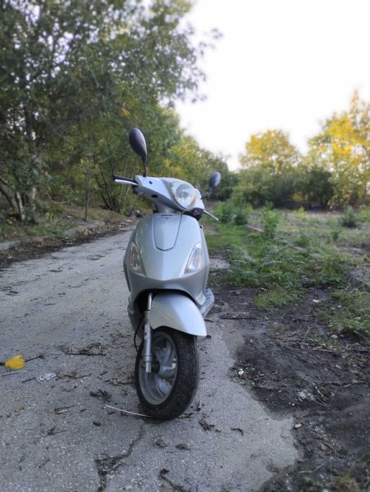 Скутер piaggio fly 125