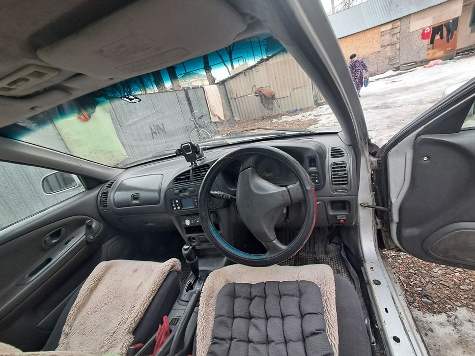 Машина митсубиши мираж