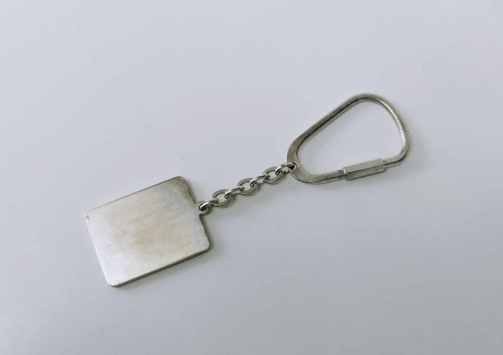 Vechi breloc alpaca , placat cu argint ,  zodia leu