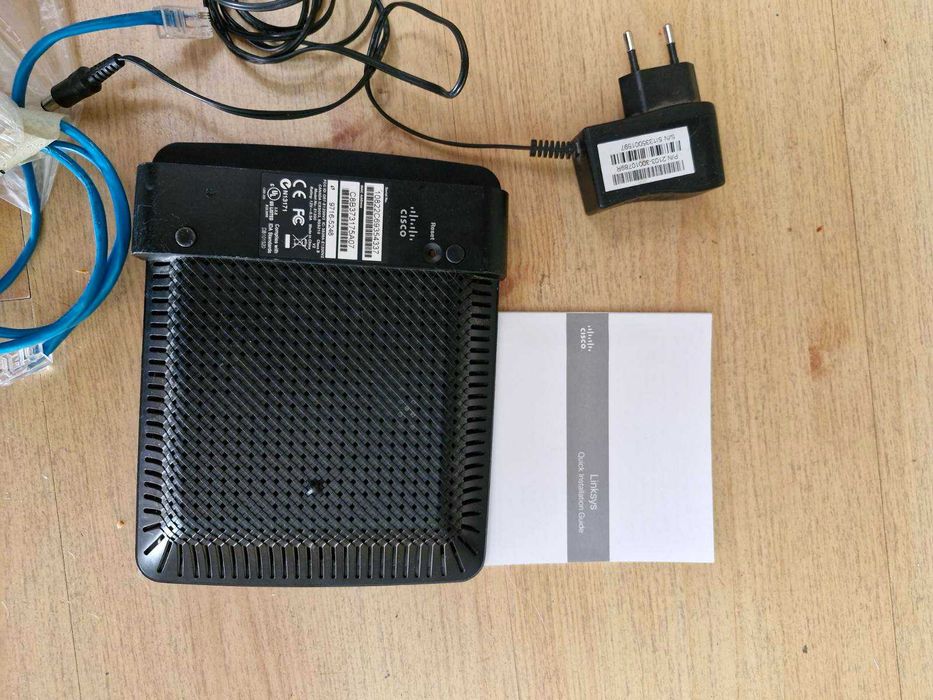 Продавам рутер cisco - Linksys E1200 300 mbps