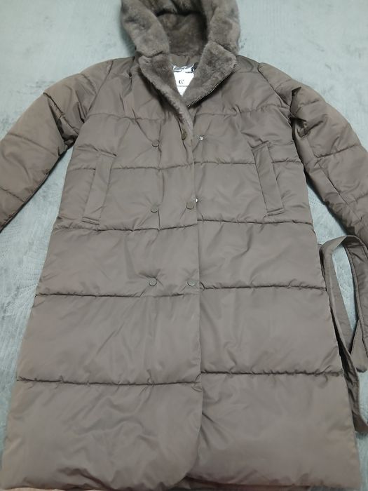 Продам пуховик новый