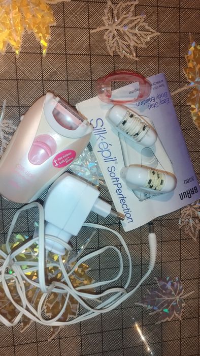 Epilator Braun cu 3 capete si 2 dispozitive pentru atenuarea durerii
