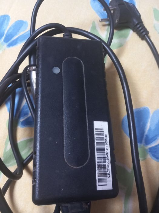 Vând încărcător  bicicleta electrica