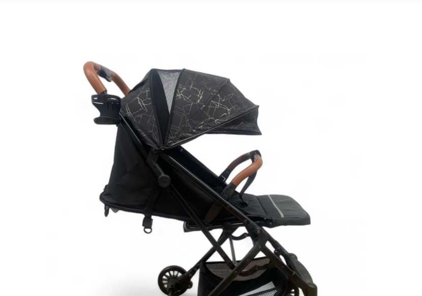 Carucior sport suspensii pliabil si troler 6-36 luni  Negru cu auriu