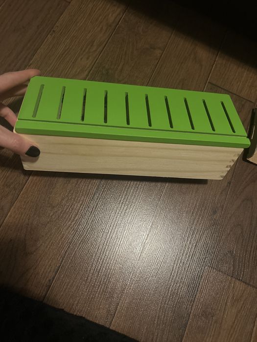 Jucarie de lemn sortator