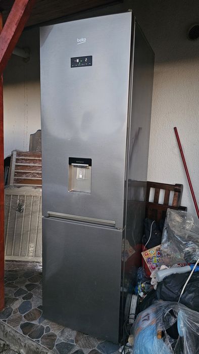 Combina beko cu dozator 1000lei