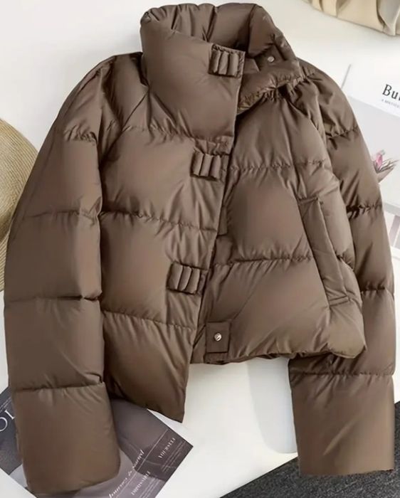 Продам новый зимний пуховик