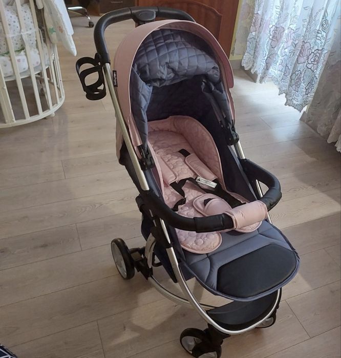 Продам прогулочную коляску для девочки