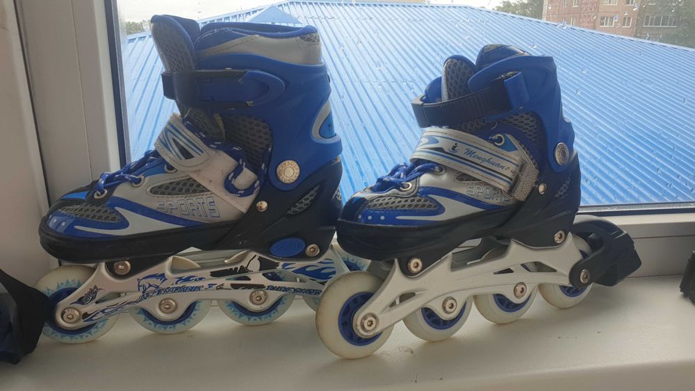 Роликовые коньки