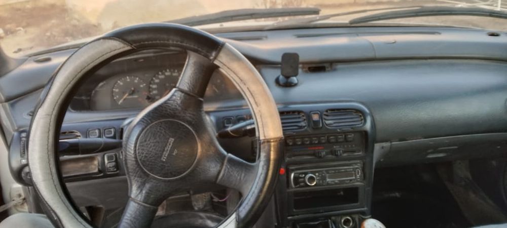 Мазда кронос 2обьем