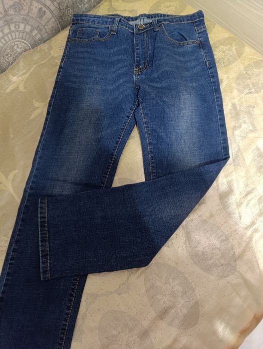 Джинсы в отличном состояние