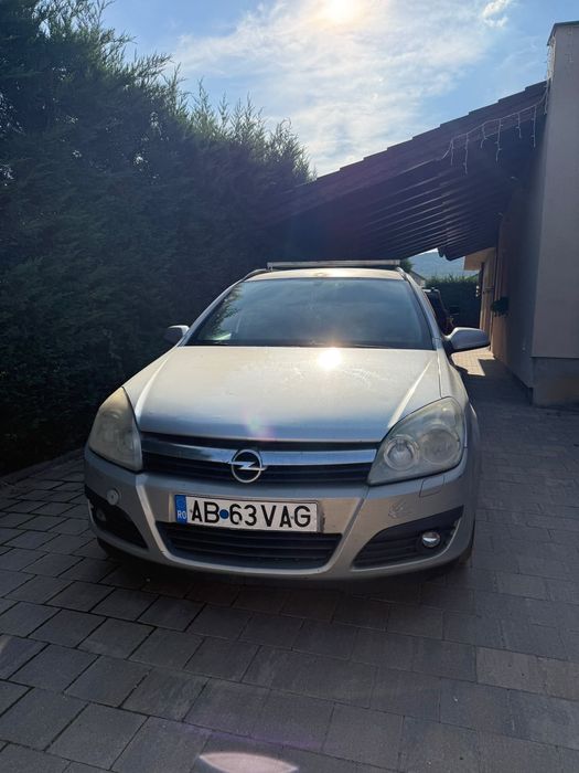 Vand masina opel astra