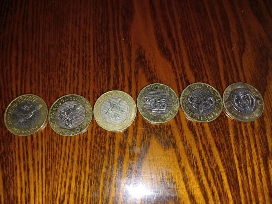 Нумизмат монеты 100 тенге