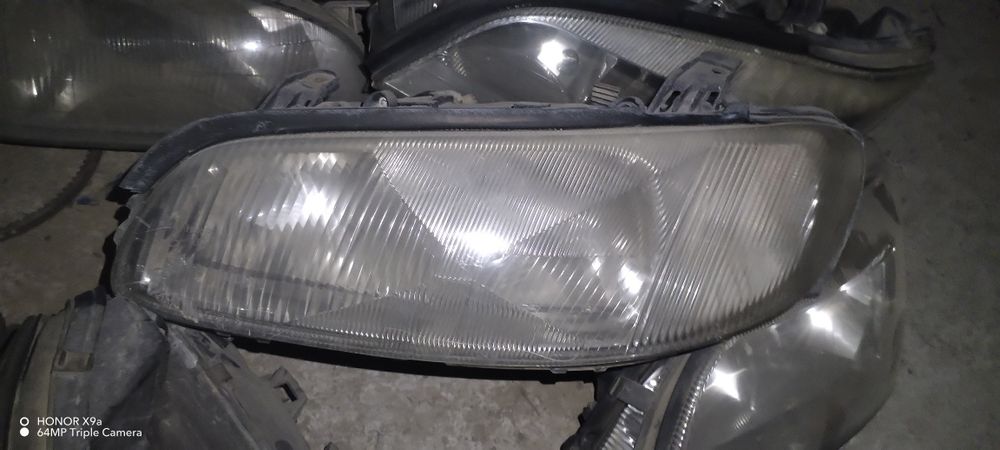 Опел Амега фара запчасти