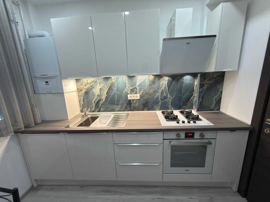 Garsoniera de lux in bloc nou privat cu curte proprie in zona stadion