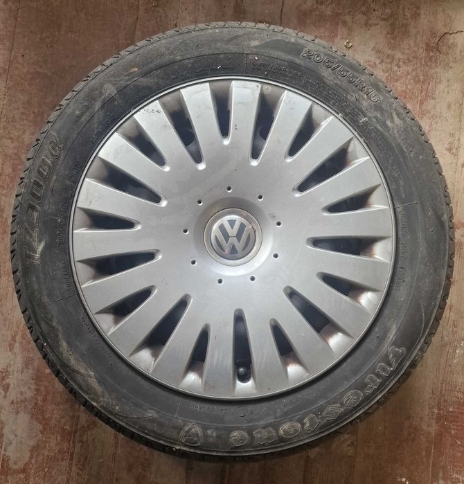 Продавам 8 гуми с джанти и тасове 5×112