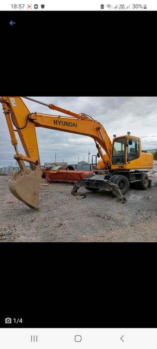 Услуги колесного экскаватора