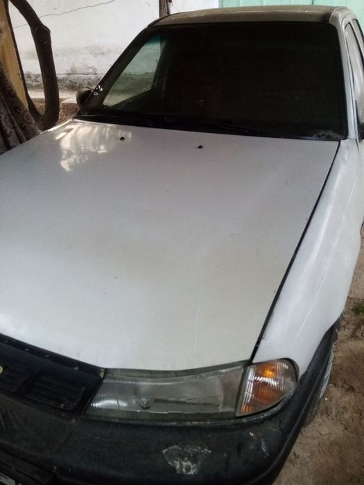 Nexia 1 sotiladi 97 yurib turibdi metandan