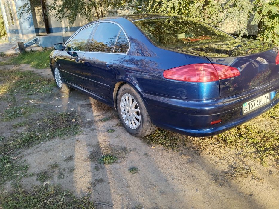 Пежо 607. Обём двигателя 2,2.