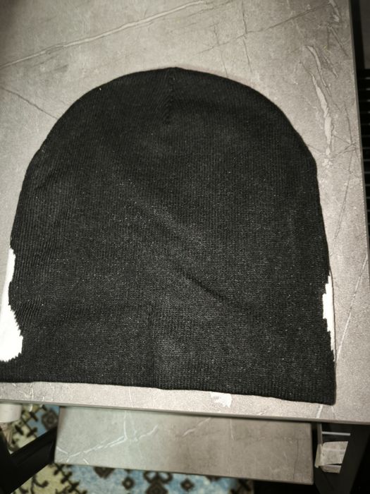 Шапка Mea Culpa.