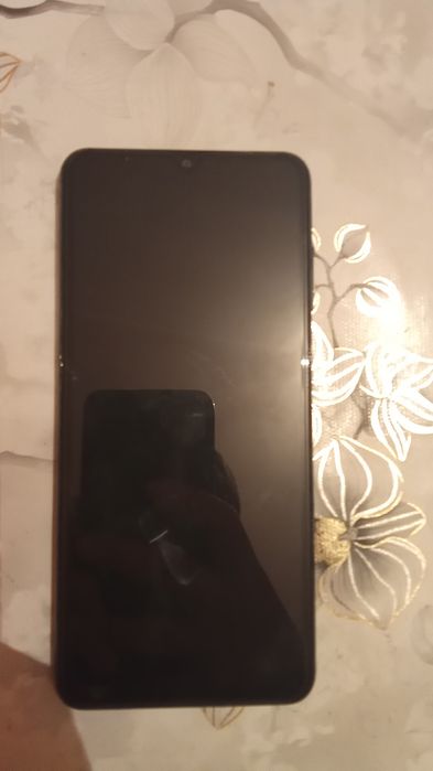 Продам телефон .