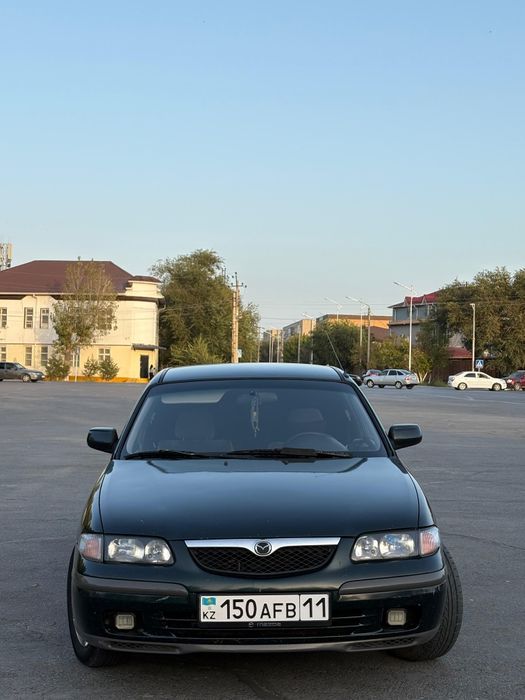 Мазда 626 птичка