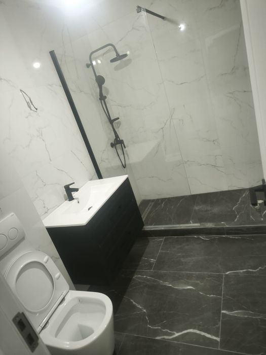 Garsoniera/ Apartament parter+ loc parcare