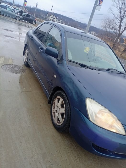 vând mitsubisi lancer