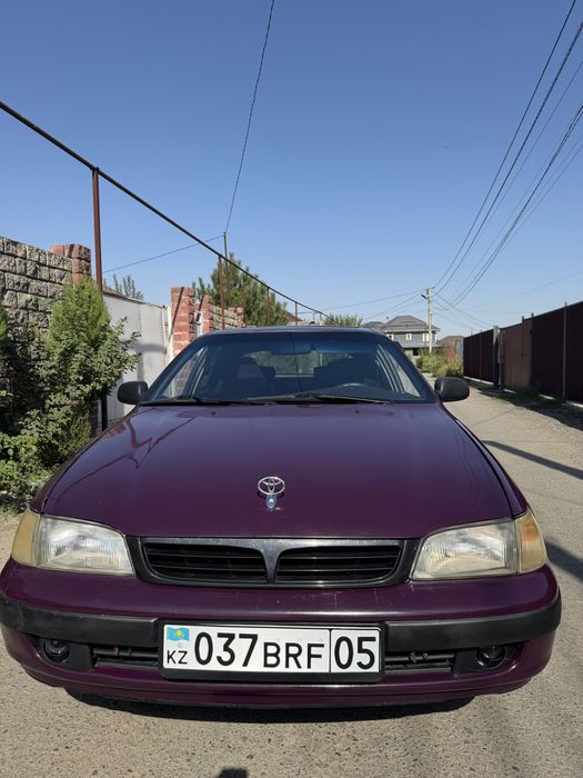 Тойота карине е.
