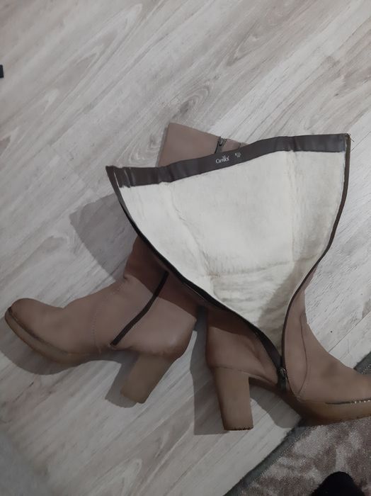 Продам натуральные сапоги