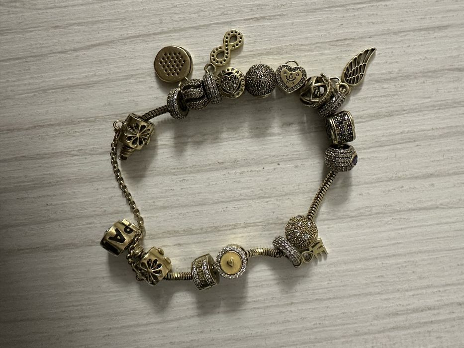 Bratara dama pandora  din aur 14 k 33 g