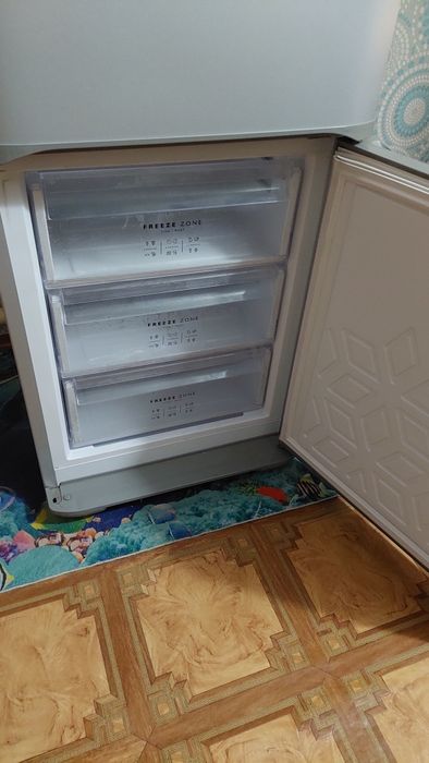 Холодильник Бирюса серебристый