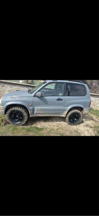 Suzuki grand vitara   Vand/Schimb cu atv cf moto sau altele