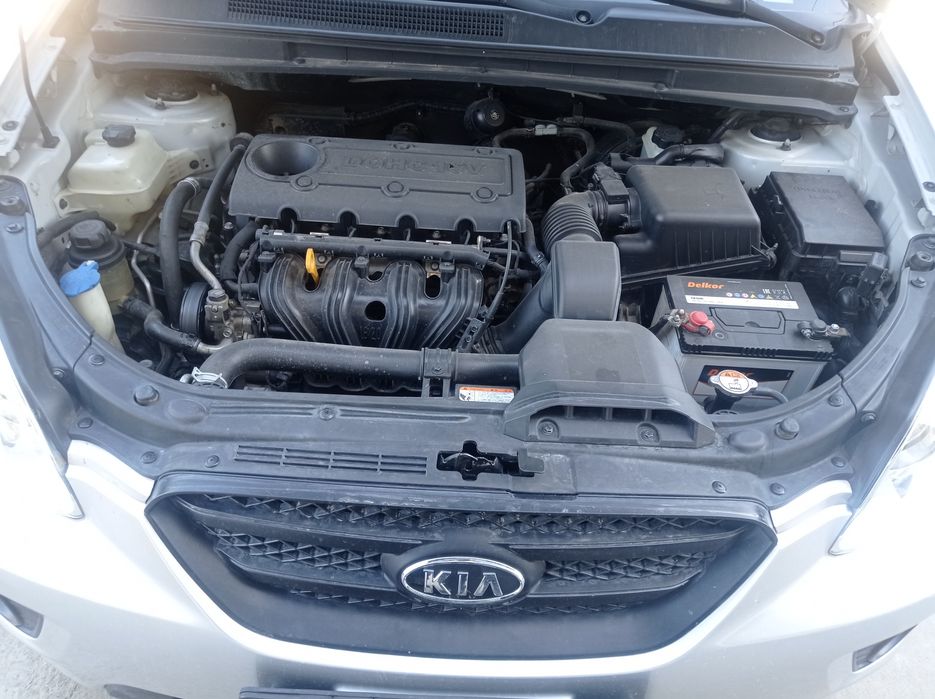 Kia carens 2010  металлик ранг  А/Т