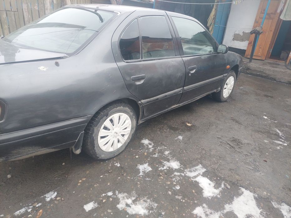 Машина ниссан примера