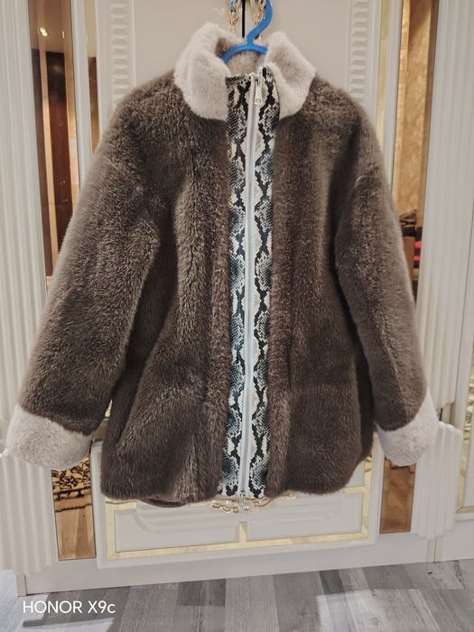 шуба очень лехкия и теплая