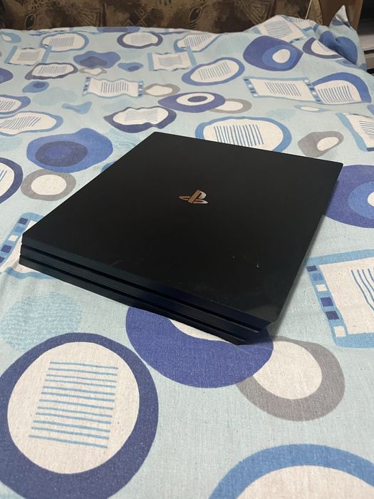Ps 4 pro plus un joc la alegere