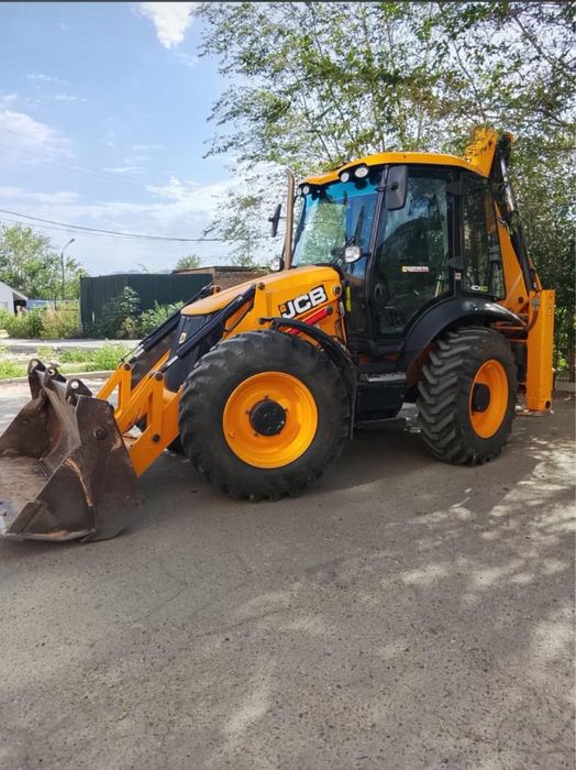 Услуги экскаватора-погрузчика