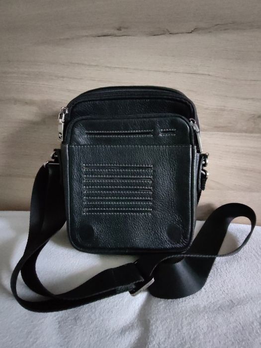 Барсетка черная от компании H.T