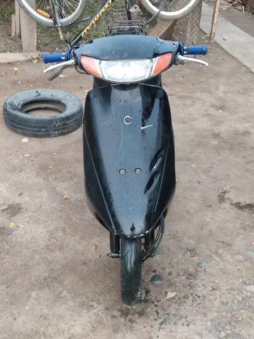 Хонда дио аф 34 .