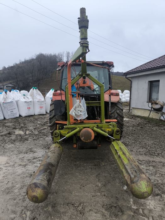 Infoliator de baloti cu autoincarcare