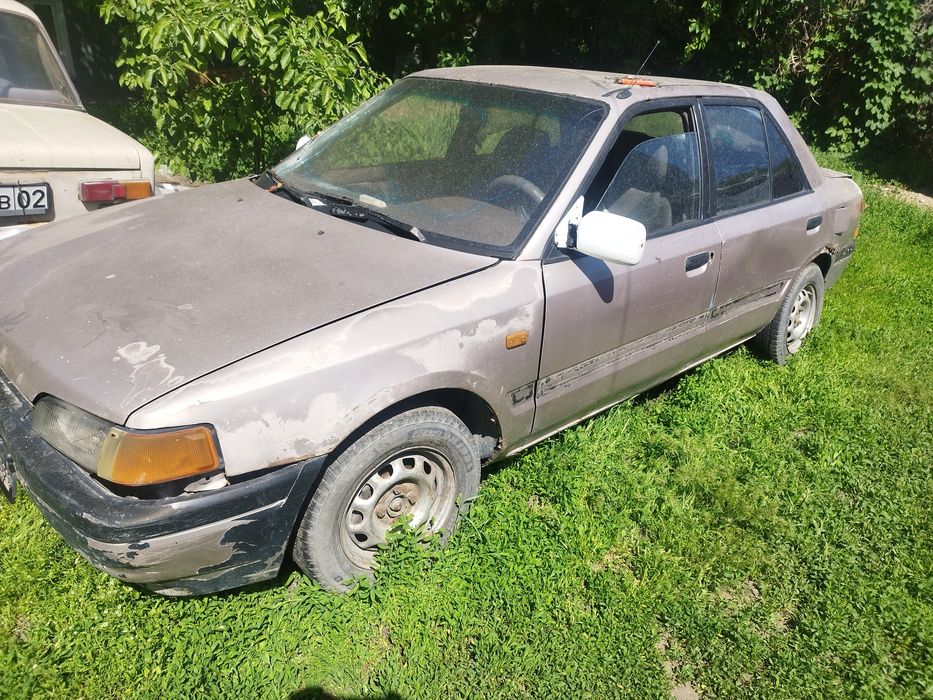 Мазад 323  на ходу