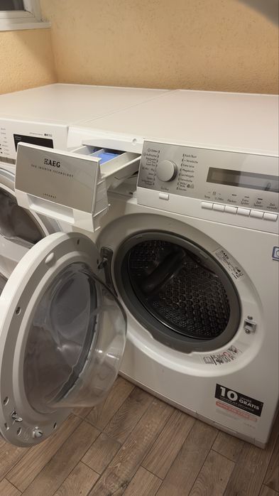 Пералня AEG 9 kg с пара + Сушилня Siemens 8 kg